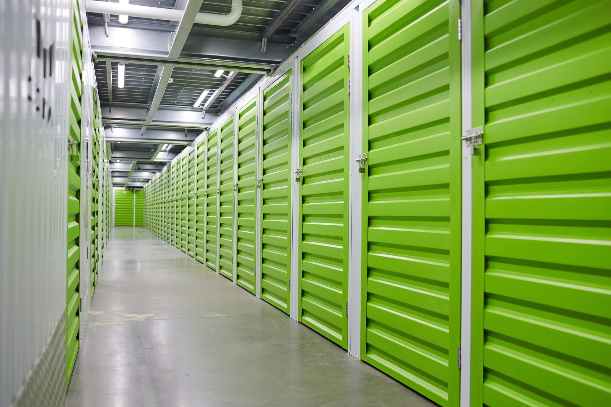 Building Type - Self Storage - Interior of a self storage facility - green doors- storage-boxes-for-storage-2021-08-27-22-16-31-utc-min 2
